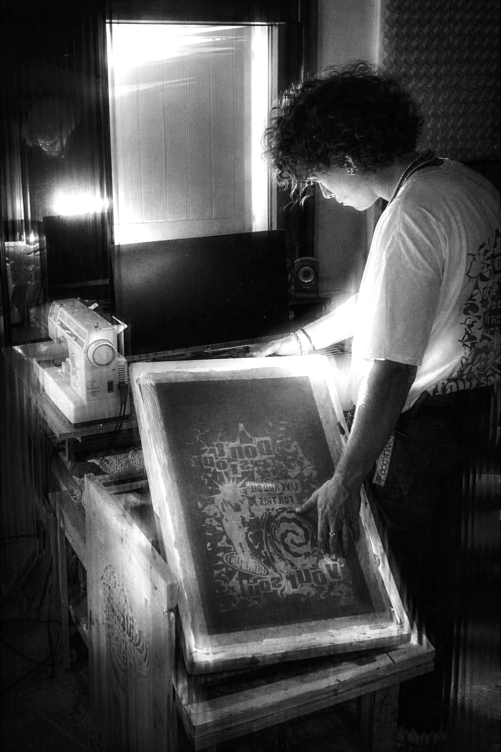 Davide Rossi working on a screen-printing frame
